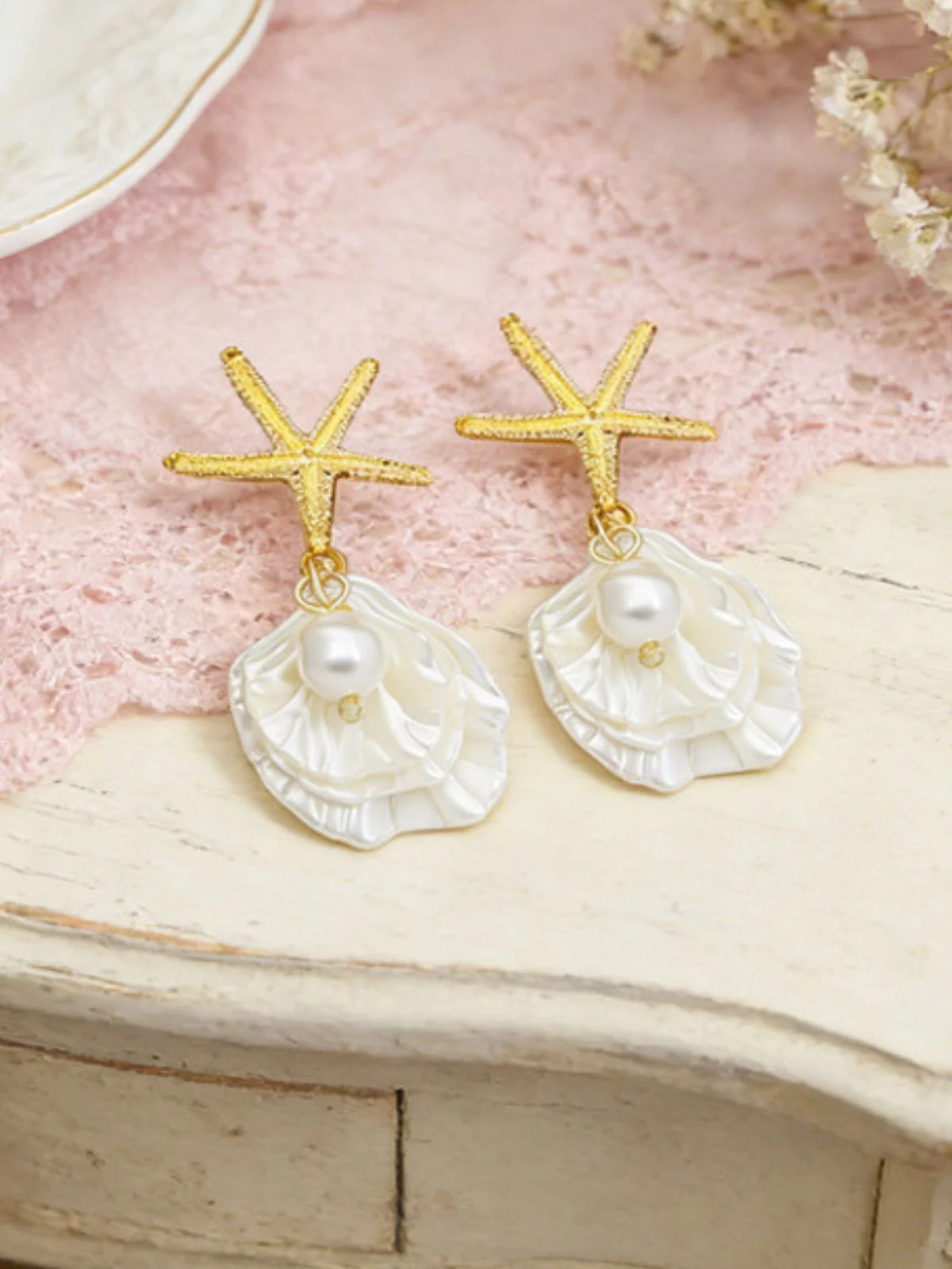 Gold Starfish Shell Pearl Drop Earrings - Image 4
