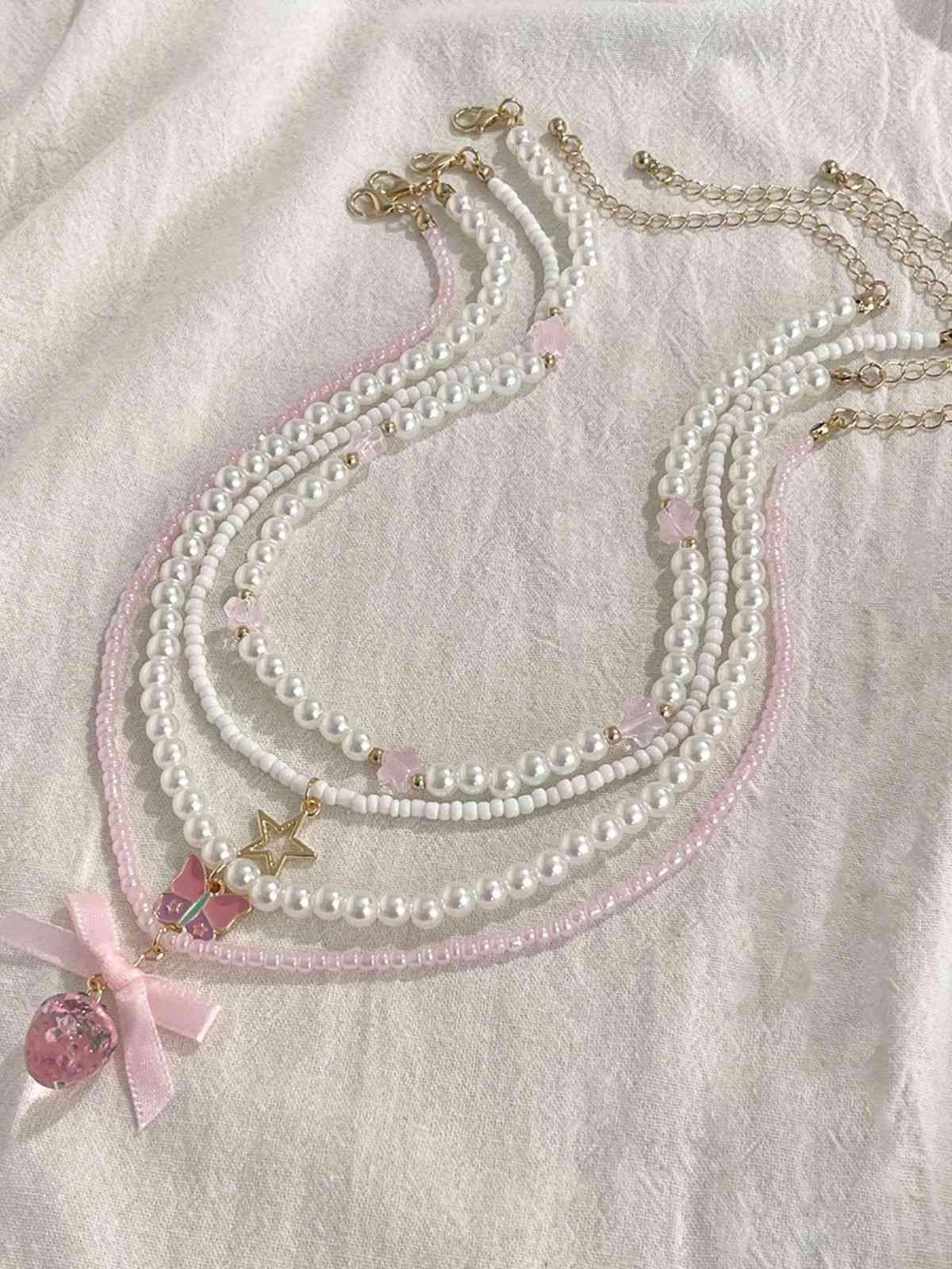 Pink & White Pearl Bow Butterfly Necklace Set - Image 5